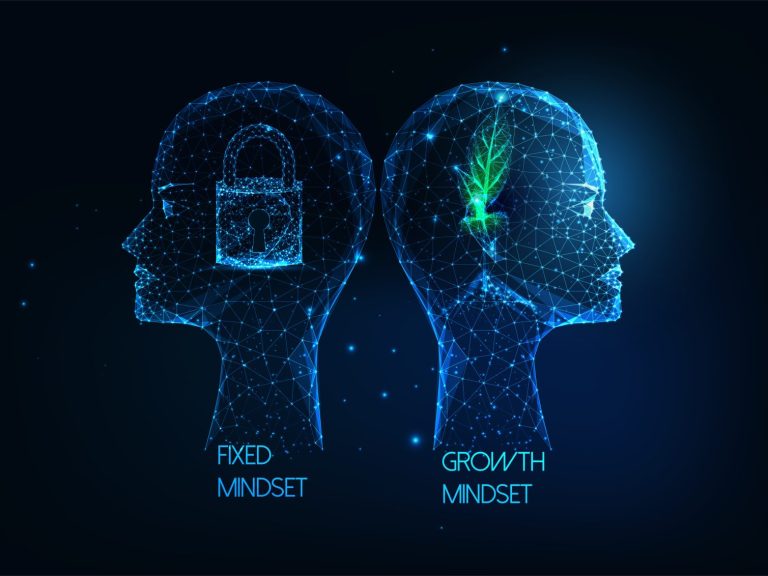 Image showing two heads, one with a fixed mindset, shown with a padlock and one with a growth mindset, shown with a plant