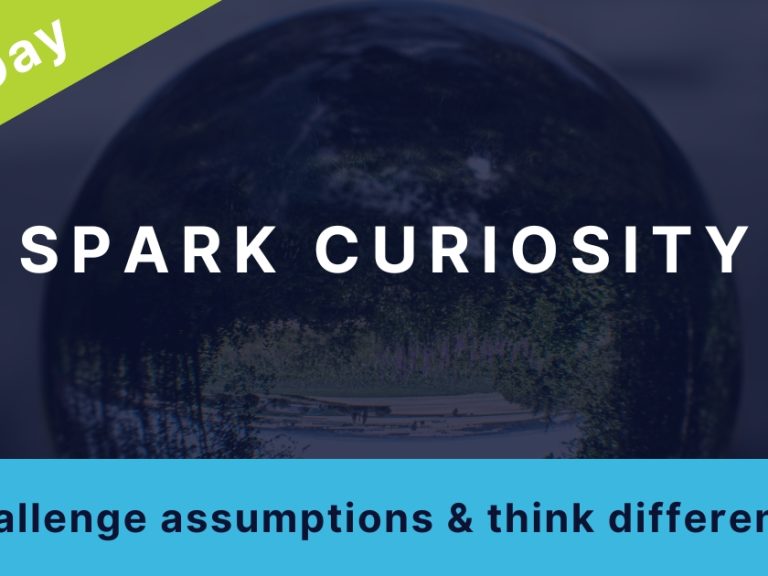 Thumbnail image for a workshop package: A photo of a round orb reflecting back an image is overlayed with the title: "Spark curiosity" Subtitle: "challenge assumptions & think differently" Banner across one corner reads: "One Day"