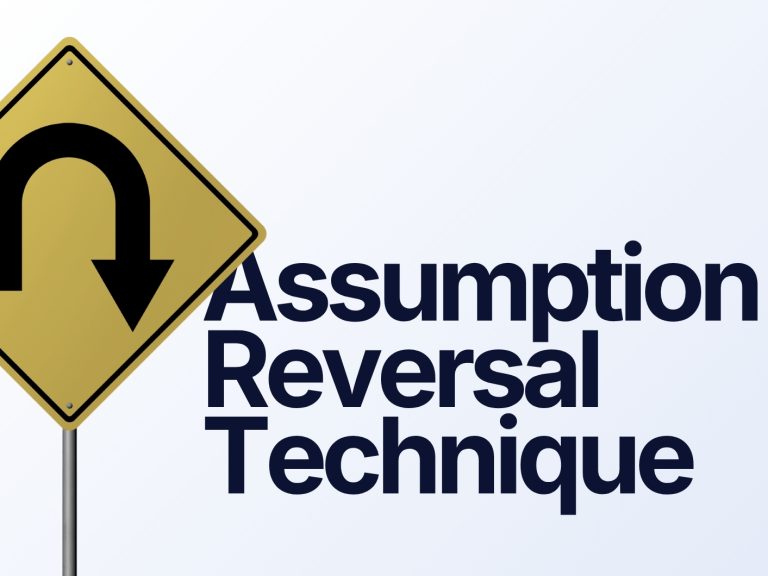 A yellow diamond-shaped road sign showing a black U-turn arrow, positioned next to large bold text that reads: "Assumption Reversal Technique".