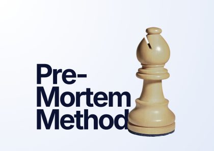 A light wood chess bishop piece standing on a white background, next to large bold text that reads: "Pre-Mortem Method".